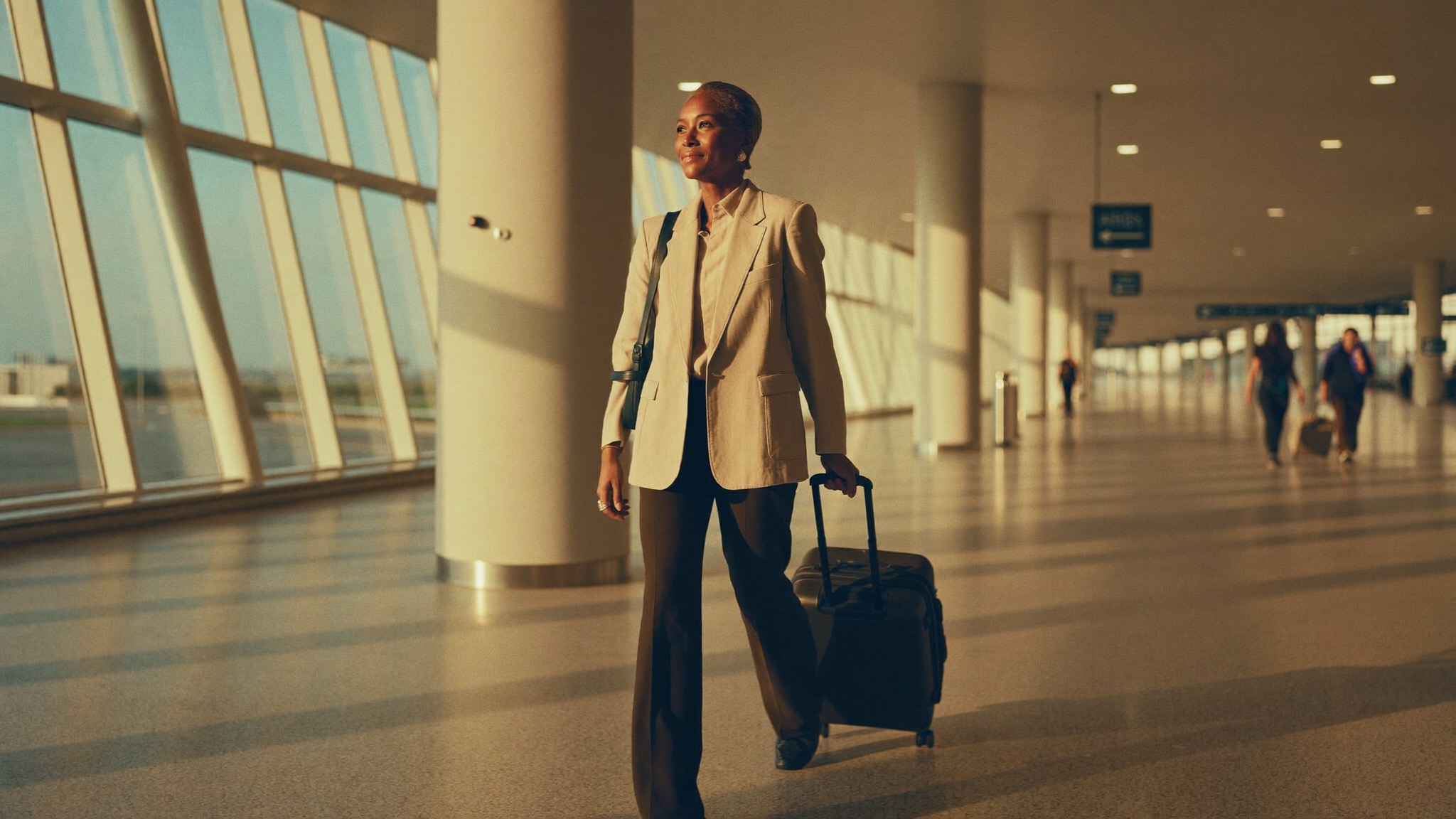 A confident mother traveling with quiet purpose toward her plan