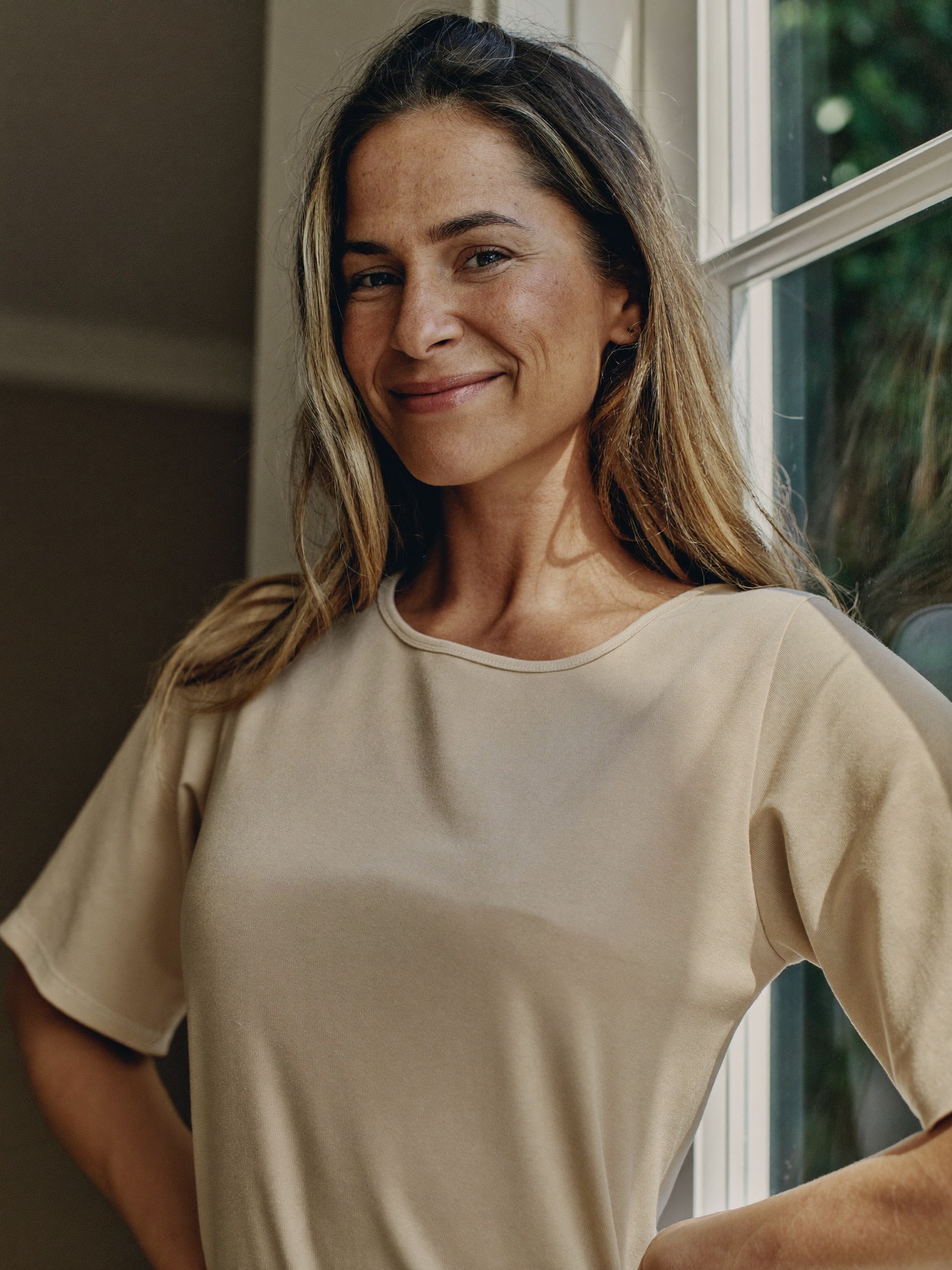 A strong, quietly confident mother, some time after her trip